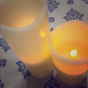 Two fake light up candles